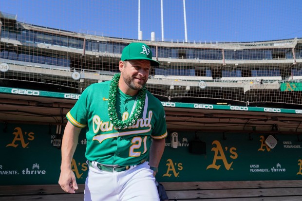 Stephen Vogt steps onto the field before the Athletics' season finale Oct. 5, 2022, against The Angels. (Godofredo A. Vásquez - The Associated Press)