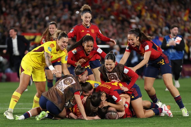 SYDNEY, AUSTRALIA - AUGUST 20: Spain players celebrate after the team's victory in the FIFA Women's World Cup Australia & New Zealand 2023 Final match between Spain and England at Stadium Australia on August 20, 2023 in Sydney, Australia. (Photo by Cameron Spencer/Getty Images)