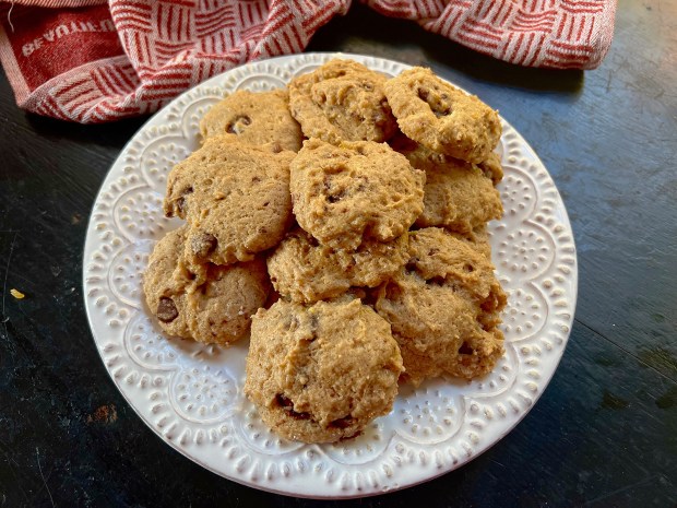 A plate of banana chocolate chip cookies.