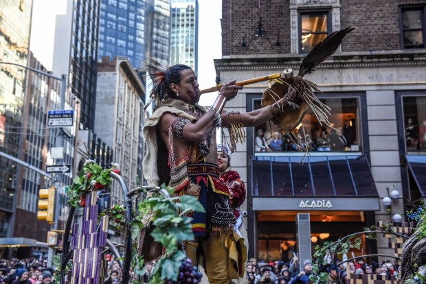 NEW YORK, NEW YORK - NOVEMBER 23: Native American people participate in Macy's annual Thanksgiving Day Parade on November 23, 2023 in New York City. Thousands of people lined the streets to watch the 25 balloons and hundreds of performers march in this parade happening since 1924. (Photo by Stephanie Keith/Getty Images)