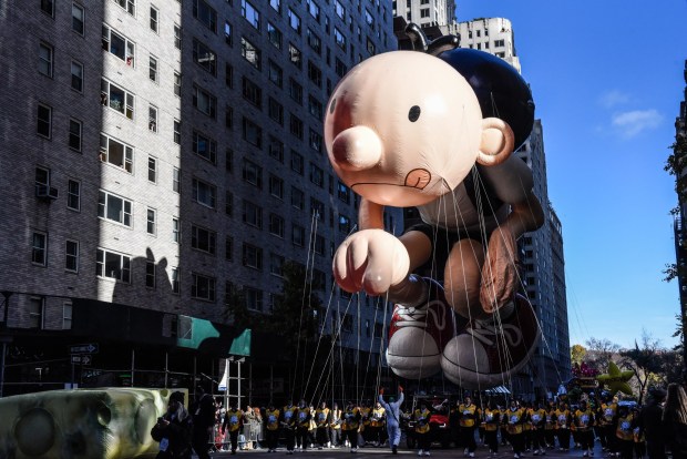 NEW YORK, NEW YORK - NOVEMBER 23: The Diary of a Wimpy Kid balloon floats in Macy's annual Thanksgiving Day Parade on November 23, 2023 in New York City. Thousands of people lined the streets to watch the 25 balloons and hundreds of performers march in this parade happening since 1924. (Photo by Stephanie Keith/Getty Images)