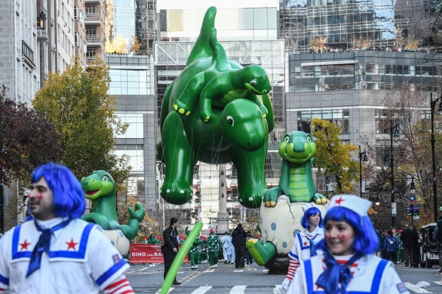 NEW YORK, NEW YORK - NOVEMBER 23: A Dinosaur balloon floats in Macy's annual Thanksgiving Day Parade on November 23, 2023 in New York City. Thousands of people lined the streets to watch the 25 balloons and hundreds of performers march in this parade happening since 1924. (Photo by Stephanie Keith/Getty Images)