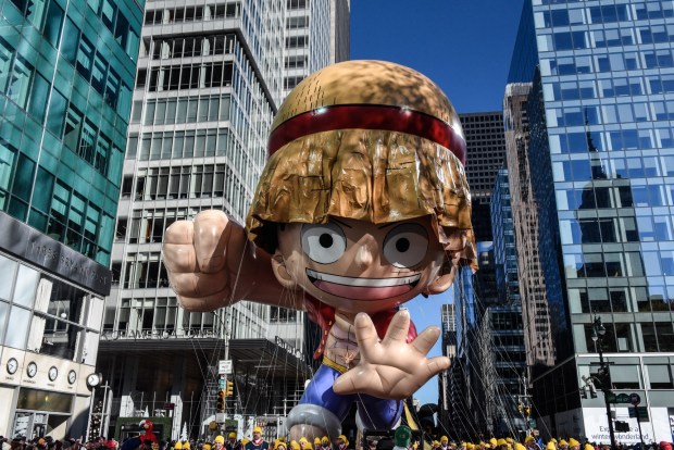 NEW YORK, NEW YORK - NOVEMBER 23: The Monkey D. Luffy balloon floats in Macy's annual Thanksgiving Day Parade on November 23, 2023 in New York City. Thousands of people lined the streets to watch the 25 balloons and hundreds of performers march in this parade happening since 1924. (Photo by Stephanie Keith/Getty Images)