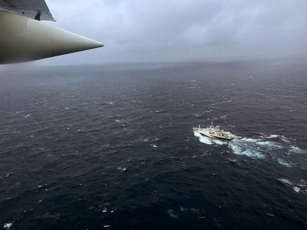 ATLANTIC OCEAN - JUNE 21: In this U.S. Coast Guard handout, a Coast Guard Air Station Elizabeth City, North Carolina HC-130 Hercules airplane flies over the French research vessel, L'Atalante approximately 900 miles East of Cape Cod during the search for the 21-foot submersible, Titan, June 21, 2023 over the Atlantic Ocean. The unified command is searching for five people after the Canadian research vessel Polar Prince lost contact with their submersible during a dive to the wreck of the Titanic on June 18, 2023. (Photo by U.S. Coast Guard via Getty Images)