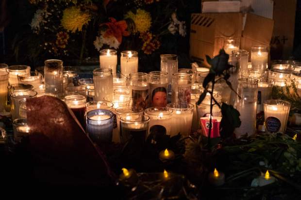 TOPSHOT - Candles are lit during a vigil outside Mexican immigration facilities where at least 38 migrants died in a fire, in Ciudad Juarez, Chihuahua state, on March 28, 2023, Mexico. - A fire believed to have been started by migrants protesting against their deportation killed at least 38 people at a Mexican immigration detention center near the US border, authorities said on March 28, 2023, prompting demands for justice.The blaze broke out late March 27 at the National Migration Institute (INM) facility in Ciudad Juarez, prompting the mobilization of firefighters and dozens of ambulances. (Photo by Guillermo Arias / AFP) (Photo by GUILLERMO ARIAS/AFP via Getty Images)