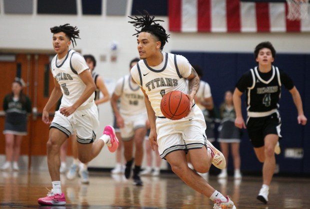 Lorain's Jai'den Guerra-Howard leads a fast break during the first quarter against Westlake on Jan. 16. (Randy Meyers - for The Morning Journal)