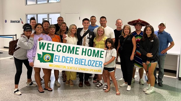 Ty Bielozer, center wearing suit and tie, of North Ridgeville, with family and friends. (Submitted)