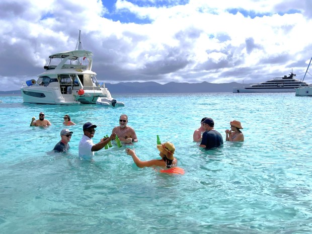 A Sakara server redefines the swim-up bar for thirsty passengers in the British Virgin Islands. (Photo by David Dickstein)