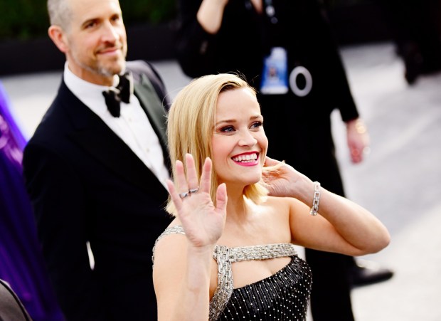 LOS ANGELES, CALIFORNIA - JANUARY 19: Jim Toth (L) and Reese Witherspoon attend the 26th annual Screen Actors Guild Awards at The Shrine Auditorium on January 19, 2020 in Los Angeles, California. (Photo by Chelsea Guglielmino/Getty Images)