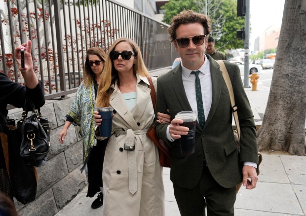 Danny Masterson and his wife Bijou Phillips arrive for closing arguments in his second trial, Tuesday, May 16, 2023, in Los Angeles. Masterson is charged with raping three women at his Los Angeles home between 2001 and 2003. (AP Photo/Chris Pizzello)