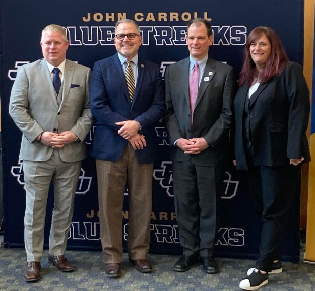 Athletic Director Brian Polian, School President Al Miciak, Wittenberg president Mark Erickson and NCAC Executive Director Keri Alexander Luchowski were in attendance Jan. 18 during a news conference announcing John Carroll is joining the North Coast Athletic Conference. (Mark Podolski The News-Herald)