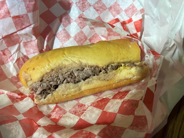 This Large Italian Beef with provolone was the main draw of a recent visit to Au Jus in Parma. (Mark Meszoros - The News-Herald)