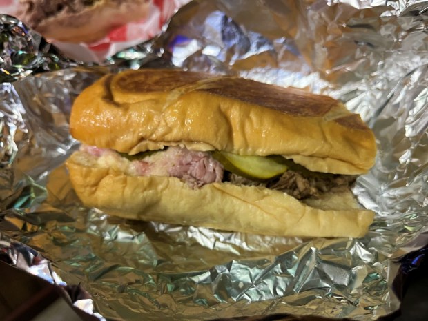 Au Jus in Parma may specialize in Italian beef sandwiches, but it offers others, including a Cuban. (Mark Meszoros - The News-Herald)