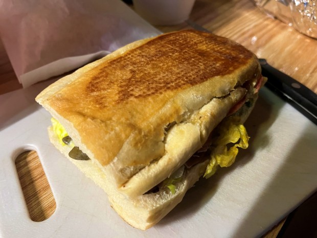 The Sicilian is one of the pressed sandwiches offered at Au Jus in Parma. However, you also can get it cold. (Mark Meszoros - The News-Herald)